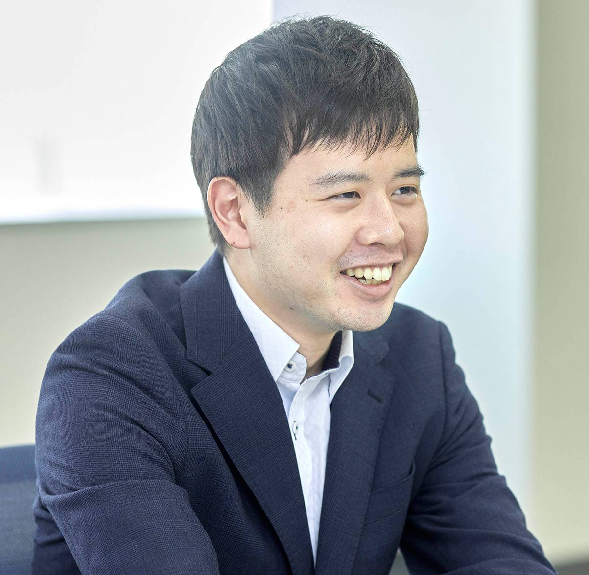 津田 楽人